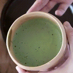 Checking the surface foam after whisking the matcha.