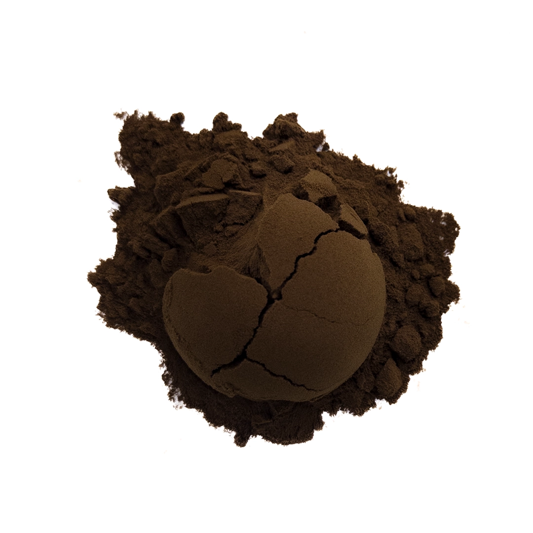 Instant Yunnan black tea powder, reddish-brown fine powder, with notes of wildflower honey and ripe fruit.