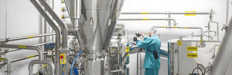 Industrial spray drying line used in instant tea powder production.